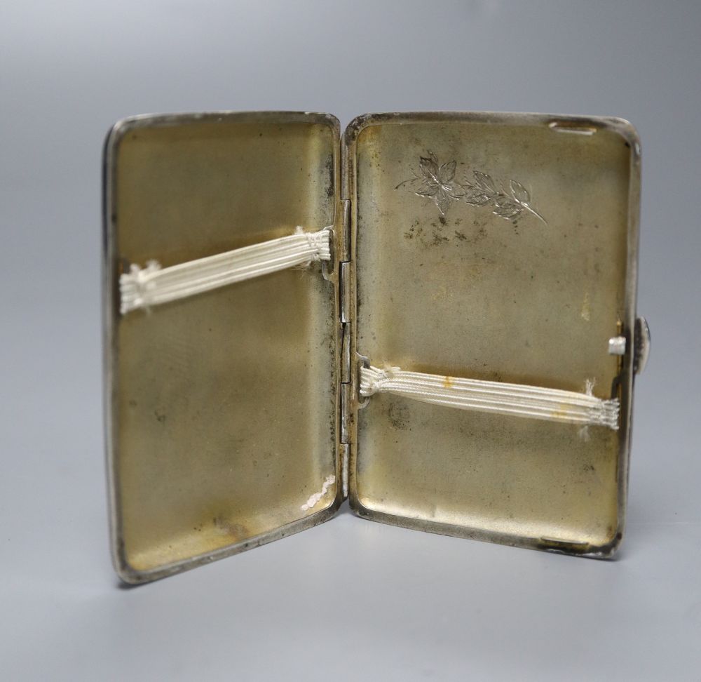 A Victorian silver handled tortoiseshell letter opener(a.f.) 25.6cm and a white metal and enamelled cigarette case, 83mm.